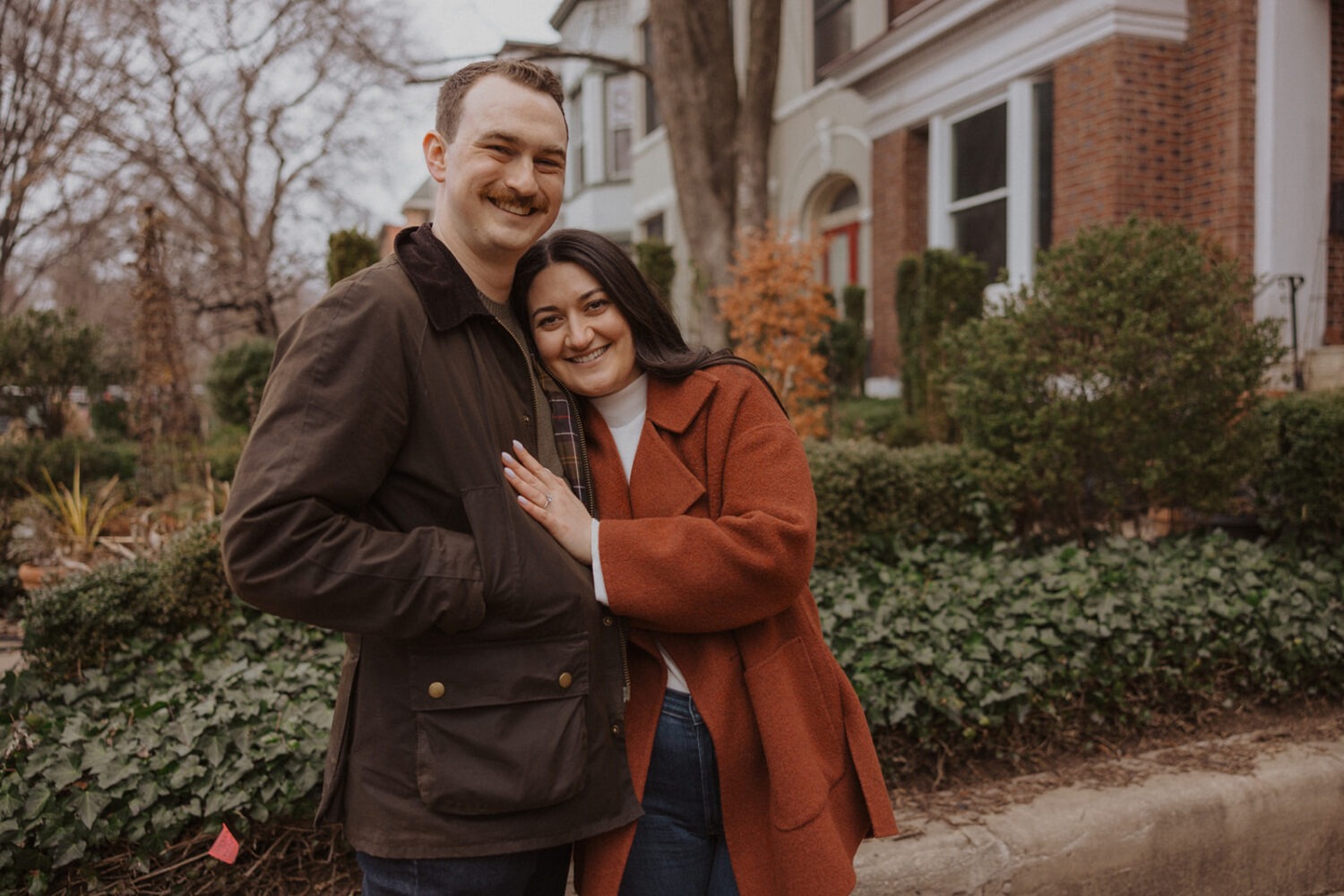 couple pose together in Washington neighborhood