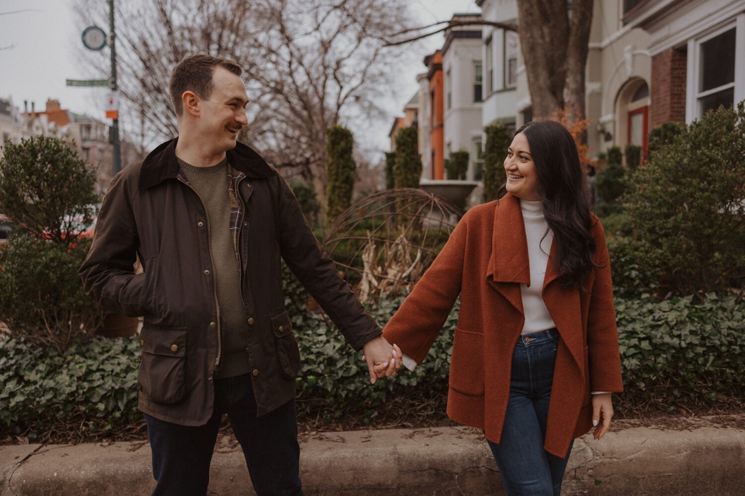 couple pose in their Washington DC neighborhood