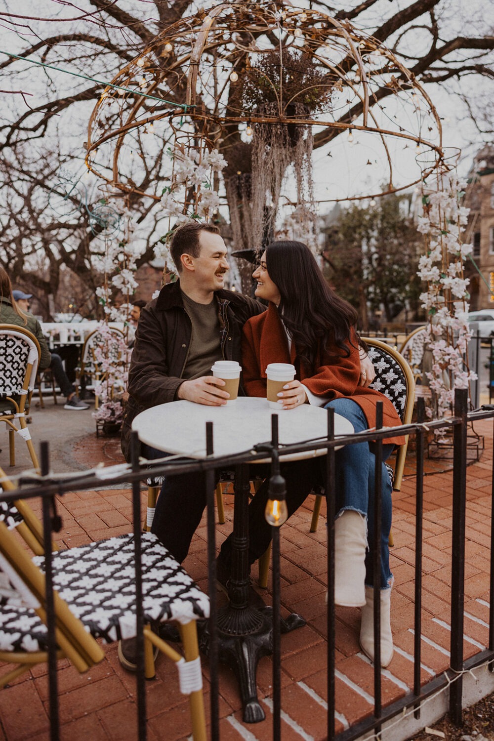 couple talking while sitting drinking coffee 