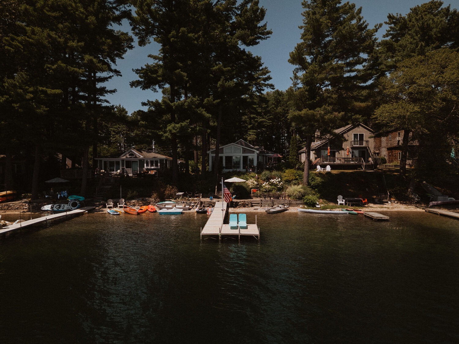 wide shot of the lake house and dock photographed by Tanner Castro Films