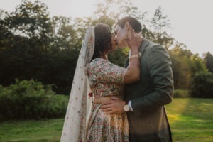 couple kiss during sunset