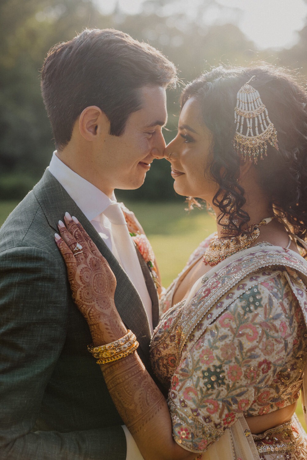 couple embrace for wedding portraits