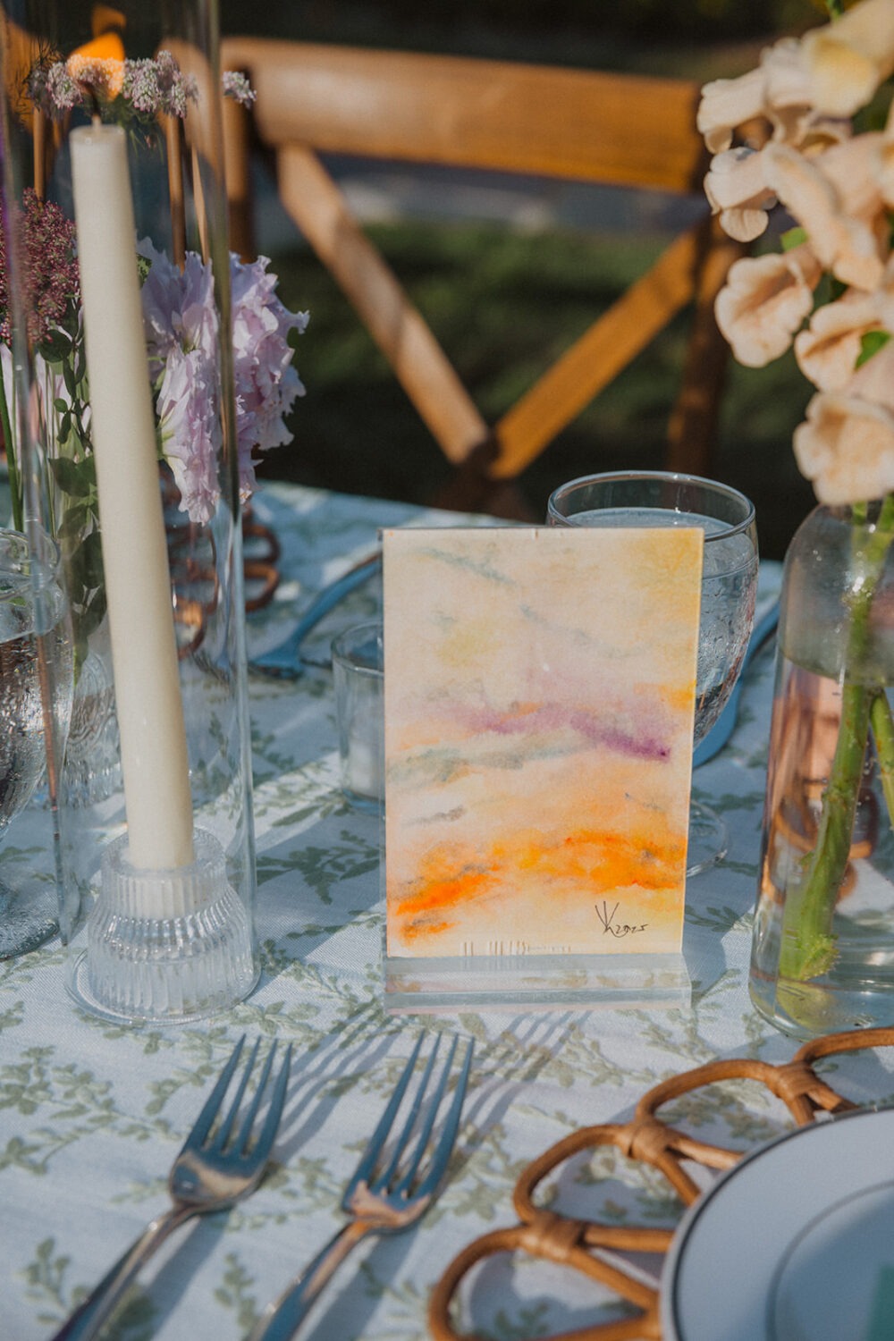 table decor featuring table numbers hand painted by the bride's father