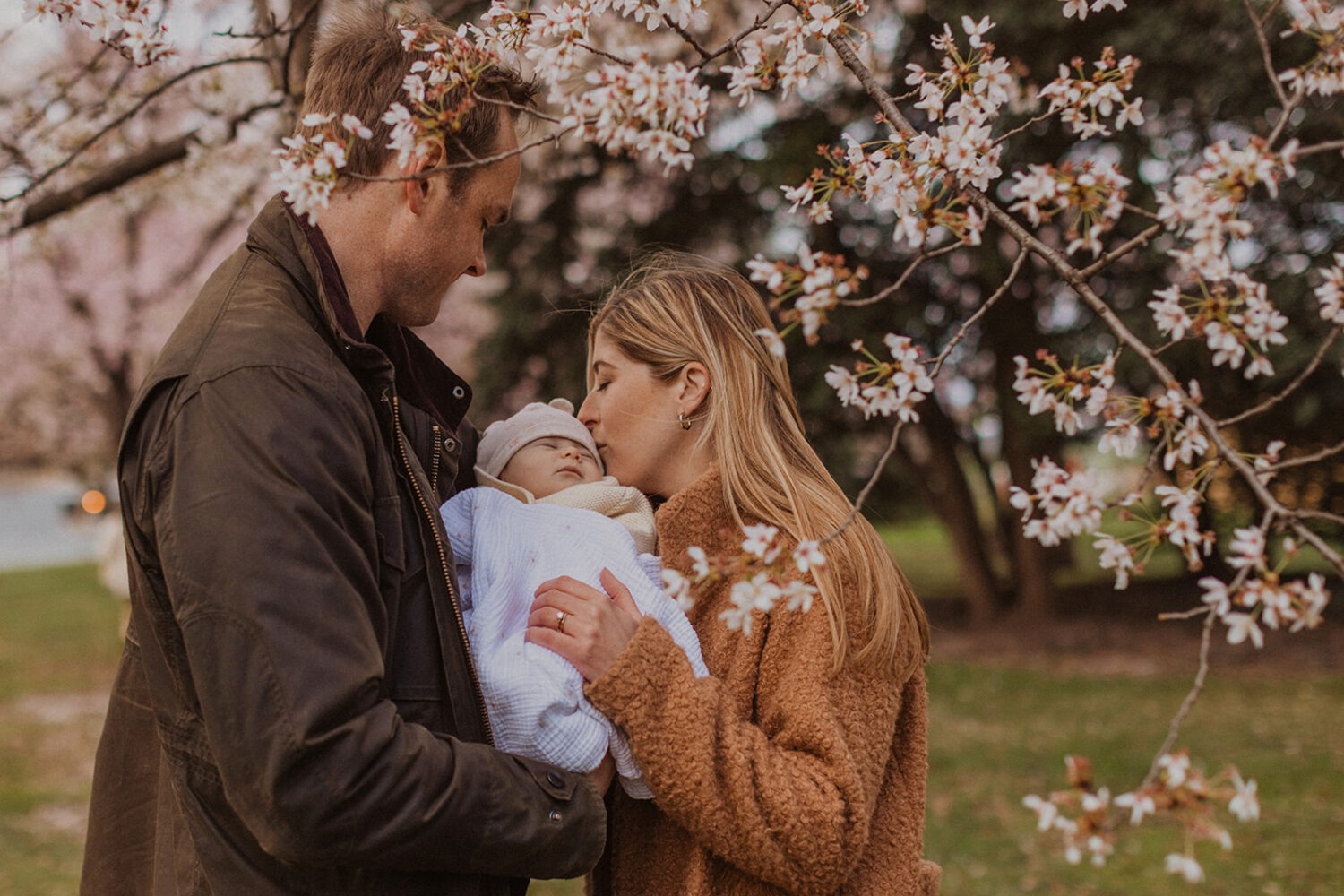 family pose while taking DC cherry blossom photos