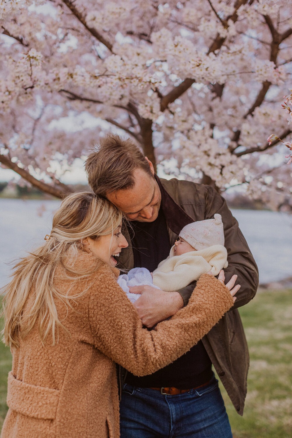 family pose while taking DC cherry blossom photos