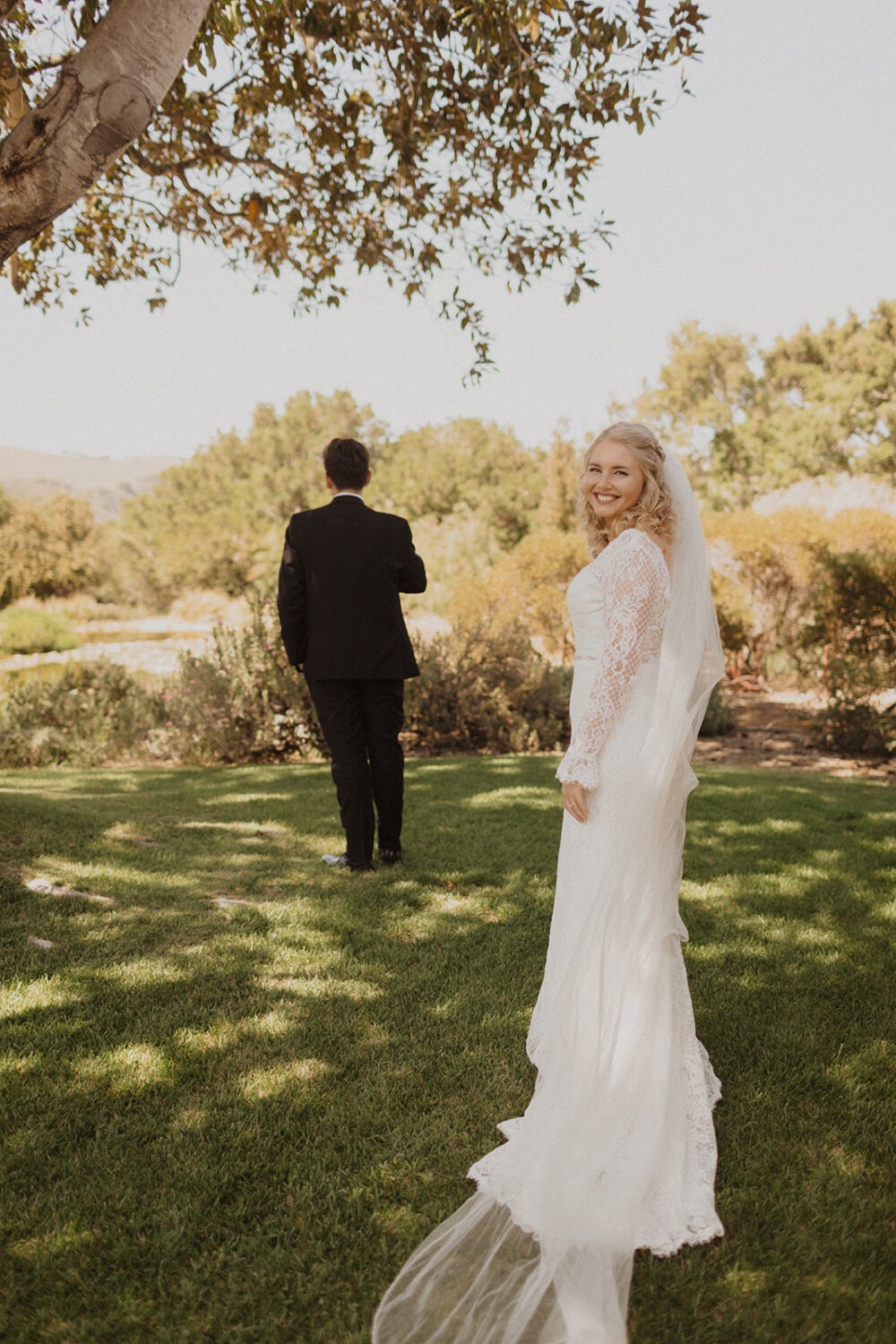 bride smiling before first look with groom
