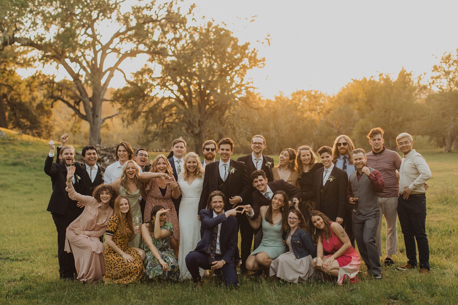 group photo of all guests at Alisal Ranch spring wedding