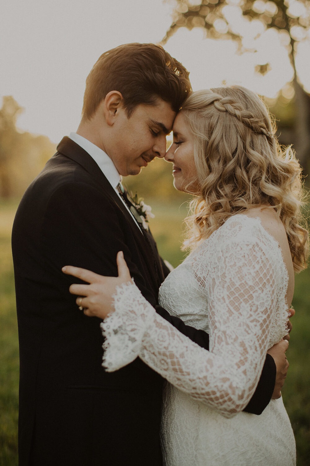 couple embrace at sunset