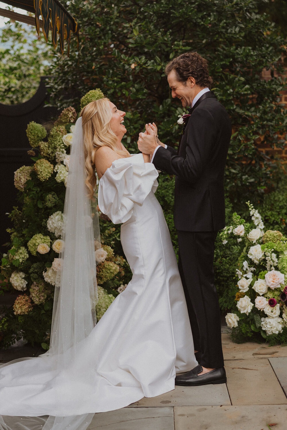 couple laughing together during ceremony
