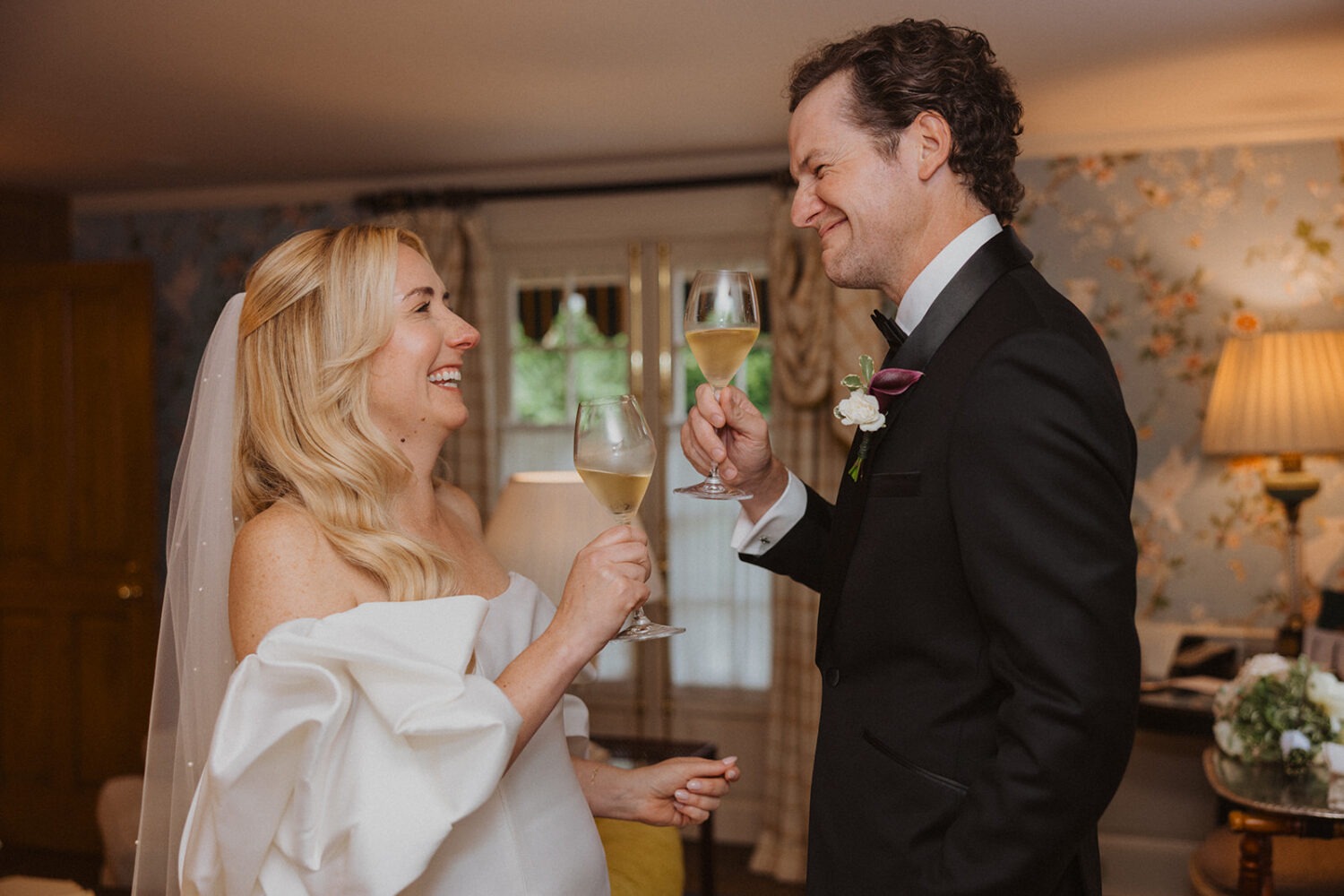 The Inn at Little Washington photos of the couple toasting with champagne