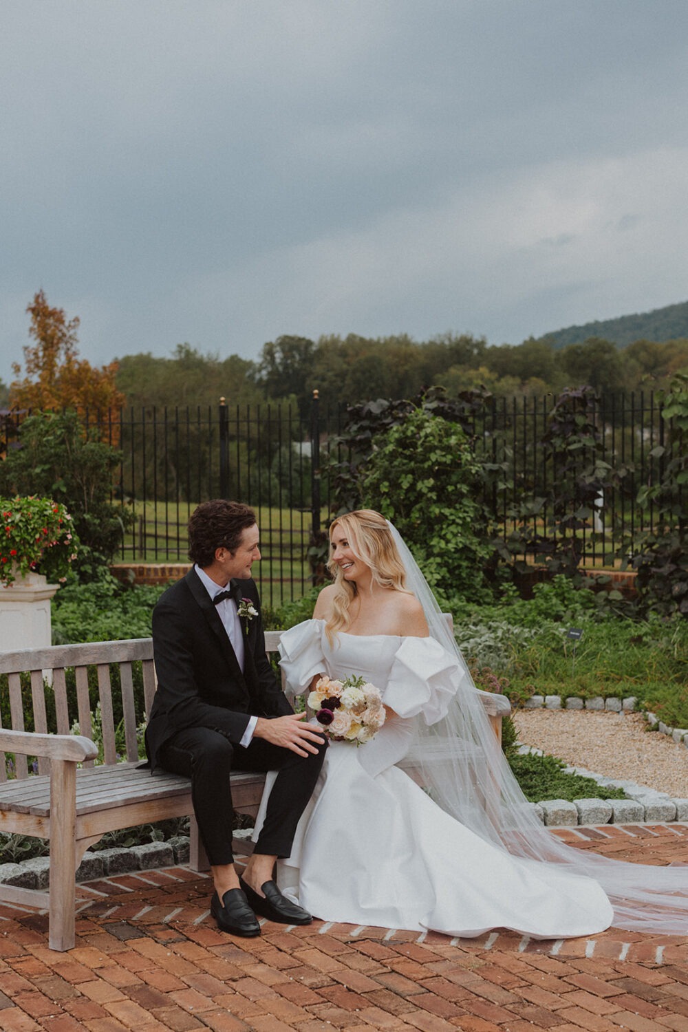 couple sitting on bench in the Garden of Scents