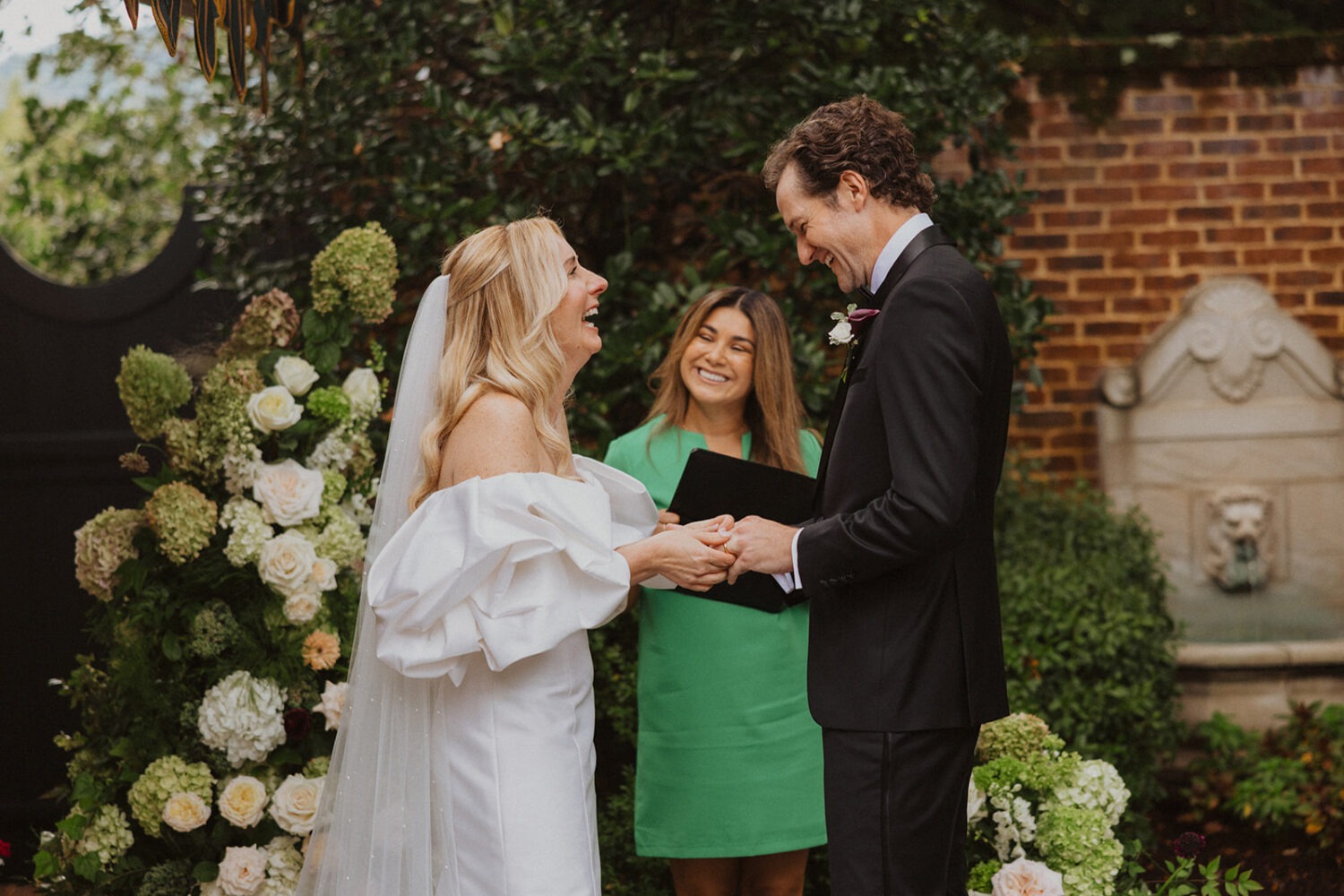 couple laughing during intimate wedding ceremony
