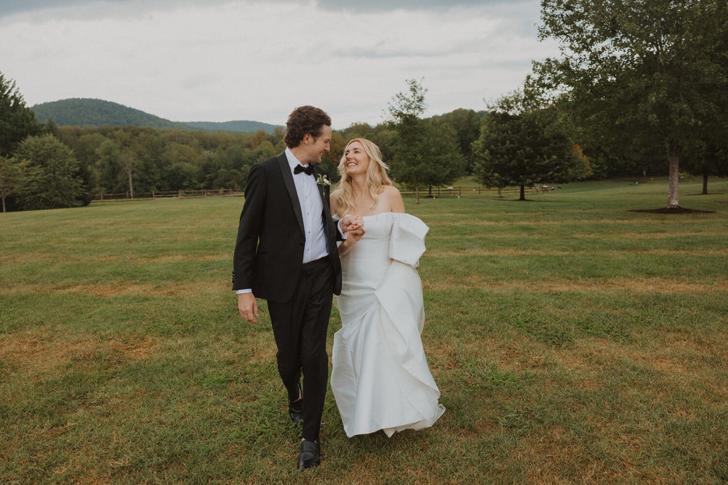 couple walking together in the open field