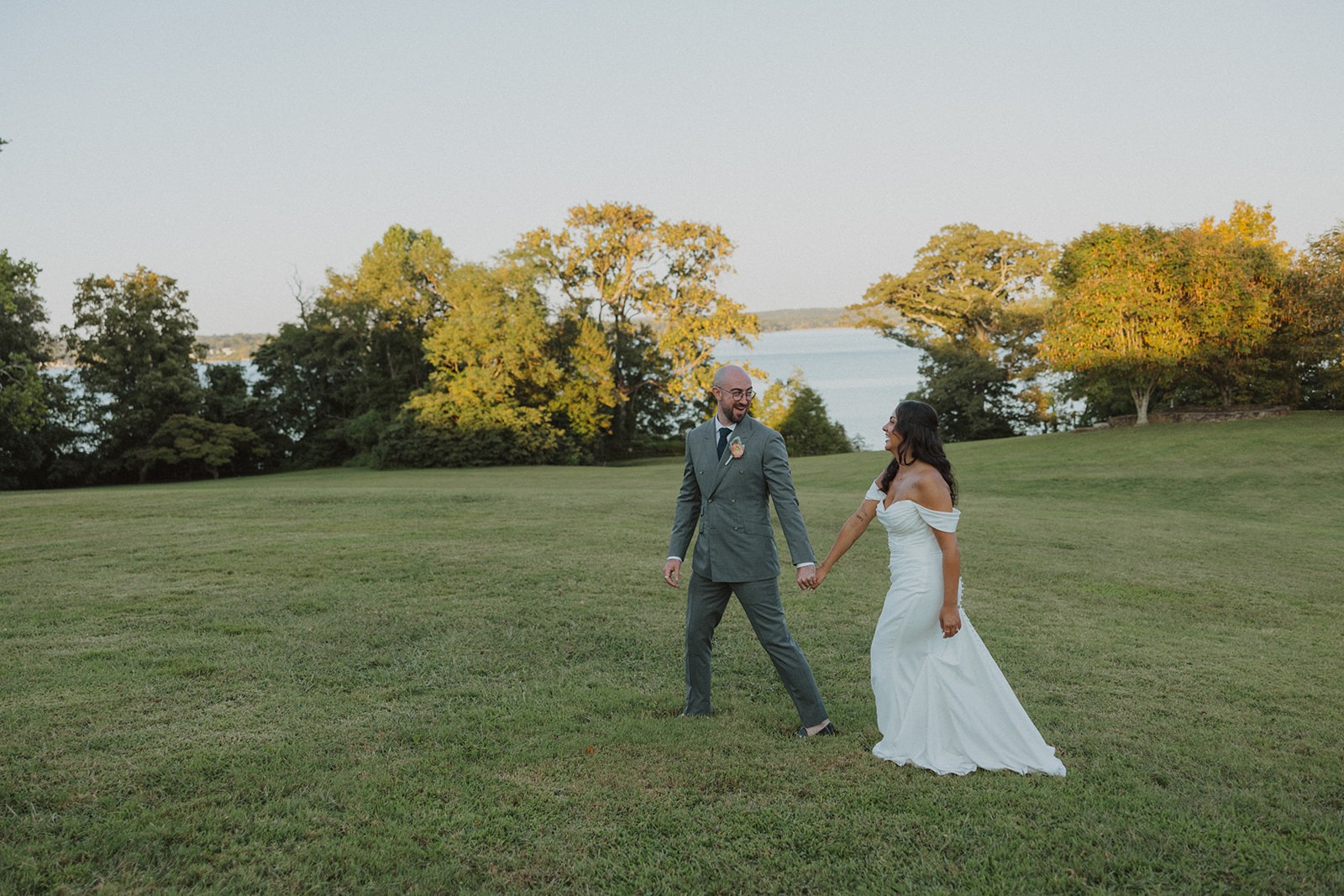couple walking by the water at River Farm Alexandria Virginia