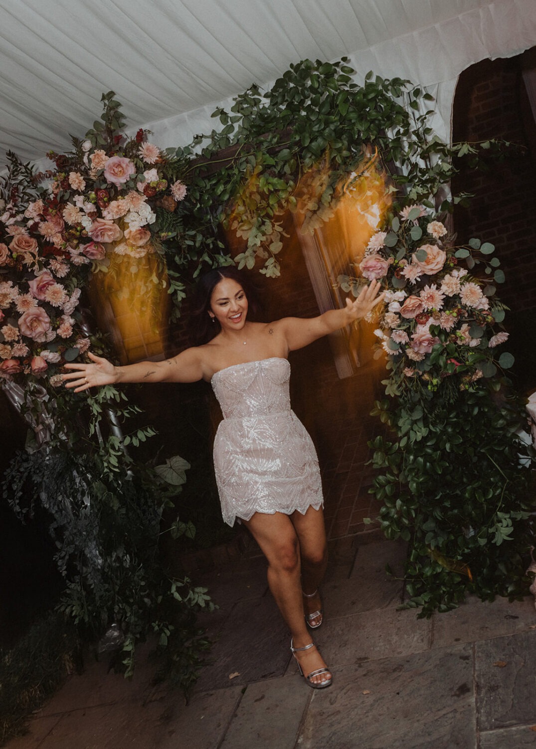 bride coming out with shorter reception dress