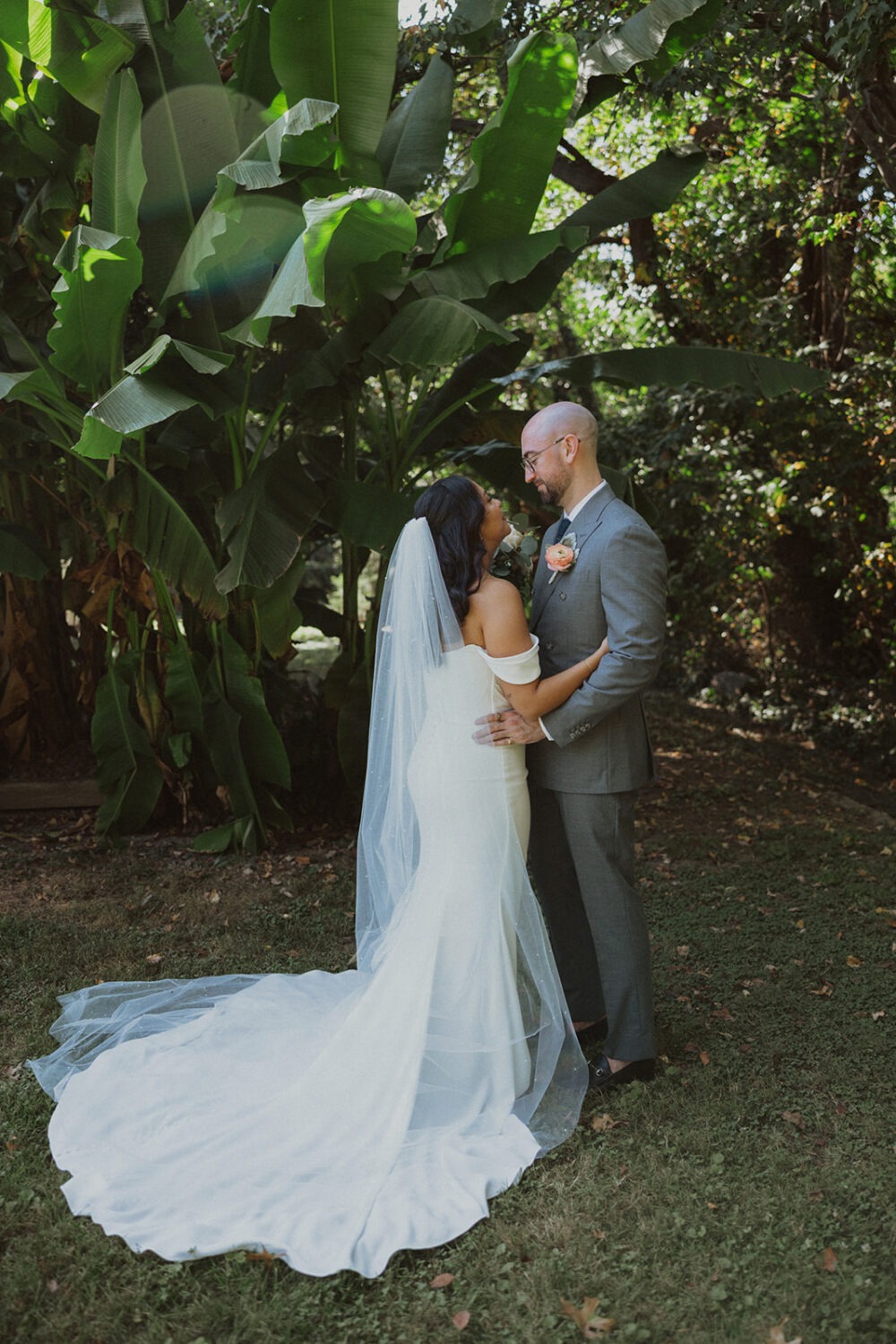 couple pose in the gardens at River Farm Alexandria Virginia