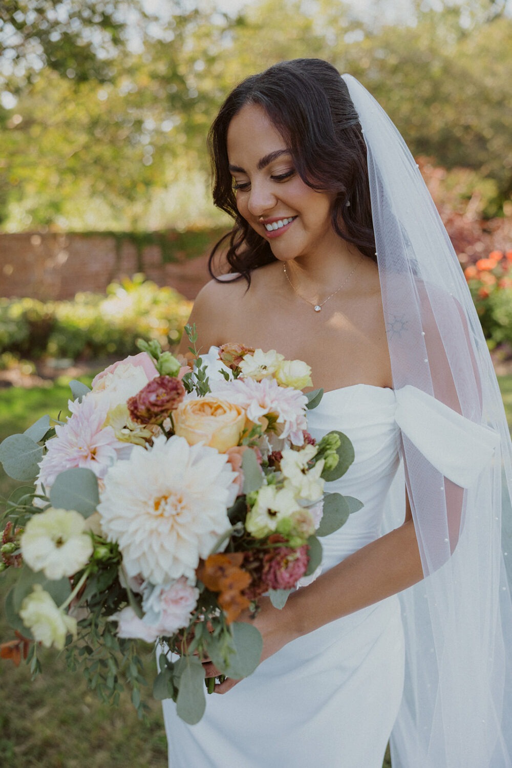 bridal portrait of bride with her wedding florals